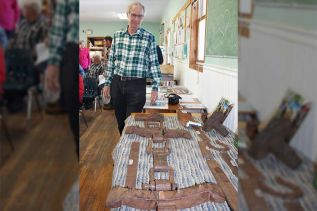 Steve Manders with some of the artifacts from the Gilmour Tramway he’s found. Photo/Craig Bakay